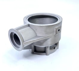 Image of a traditionally casted coupling printed on the Metal X system